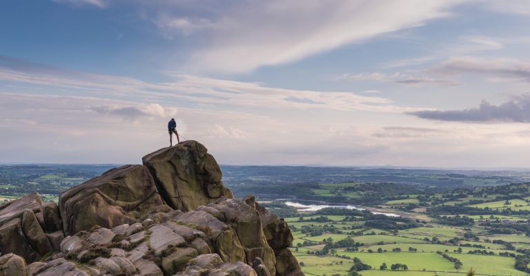 Climber on top of The Roaches, Staffordshire, England